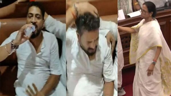 টেনে-হিচড়ে বিধানসভা থেকে বের করা হলো বিজেপি নেতাকে